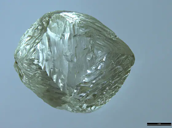 Rough 0.7-carat diamond crystal showing natural crystal faces