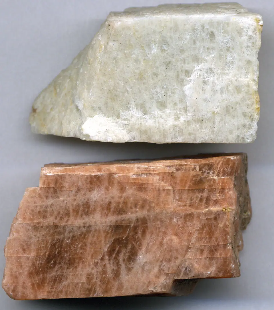 Pink potassium feldspar hand specimen showing blocky cleavage