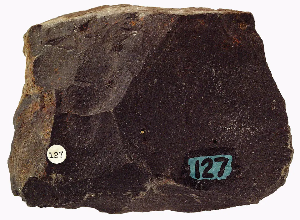 Dark, fine-grained basalt hand specimen
