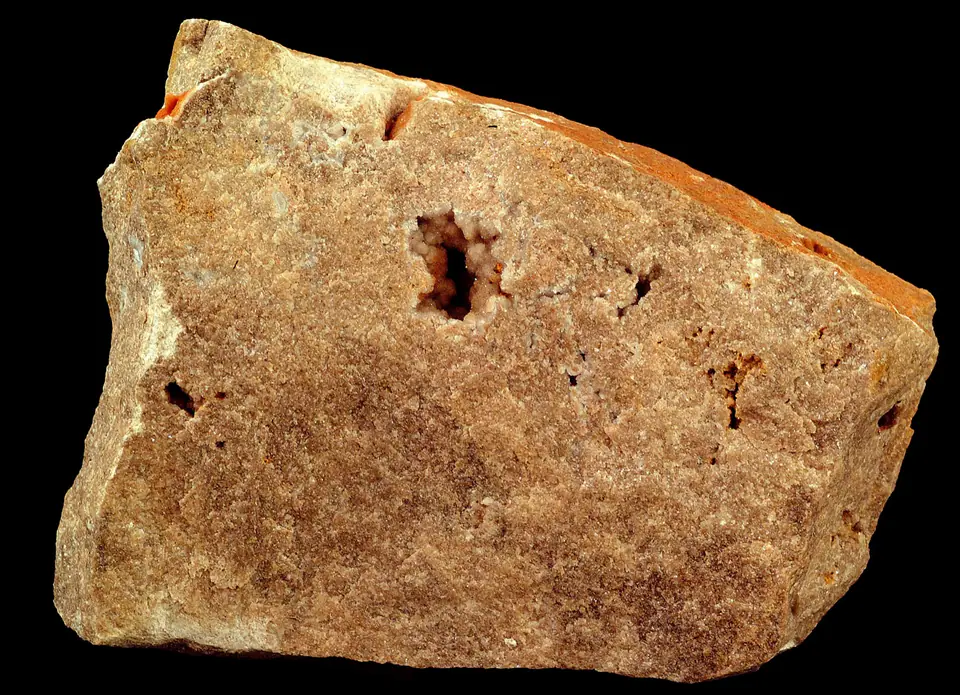 Gray-brown Potosi Dolomite hand specimen, a Cambrian dolostone composed mainly of the mineral dolomite